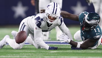Philadelphia Eagles wide receiver A.J. Brown (11) fumbles the ball after being tackled by Dallas Cowboys cornerback Stephon Gilmore (21) in the second half at AT&T Stadium.
