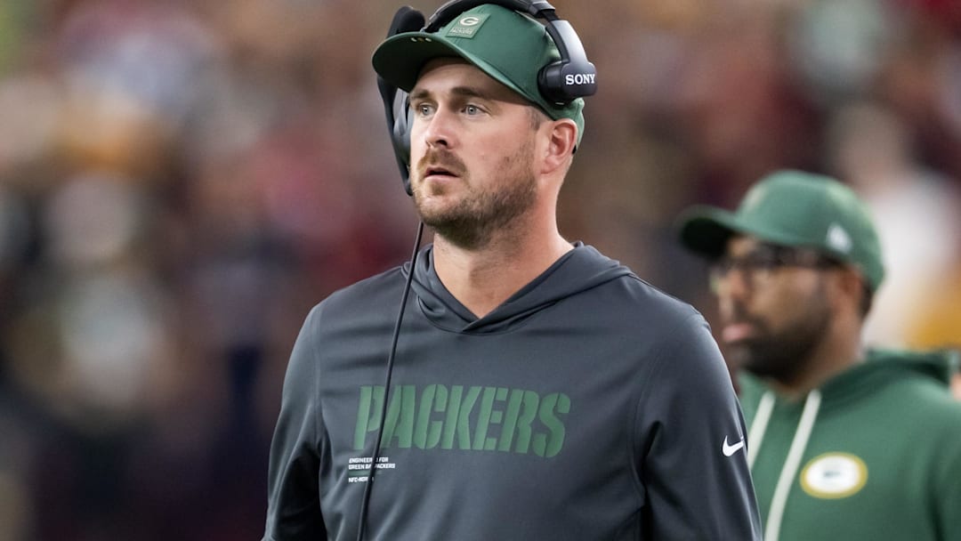 Oct 19, 2025; Glendale, Arizona, USA; Green Bay Packers quarterbacks coach Sean Mannion against the Arizona Cardinals at State Farm Stadium. Mandatory Credit: Mark J. Rebilas-Imagn Images