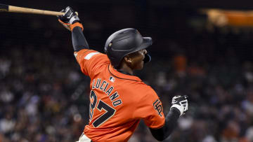 May 17, 2024; San Francisco, California, USA; San Francisco Giants shortstop Marco Luciano (37) hits an RBI single against the Colorado Rockies during the seventh inning at Oracle Park. 