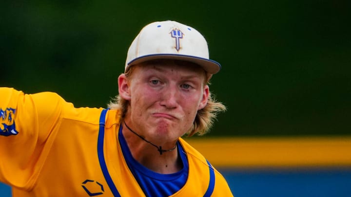 Martensdale St Marys' Travis White (13) pitches during the 1A state championship on July 25, 2025, at Merchants Park in Carroll, Iowa. Martensdale St Marys' Travis White (13) pitches during the 1A state championship on July 25, 2025, at Merchants Park in Carroll, Iowa.