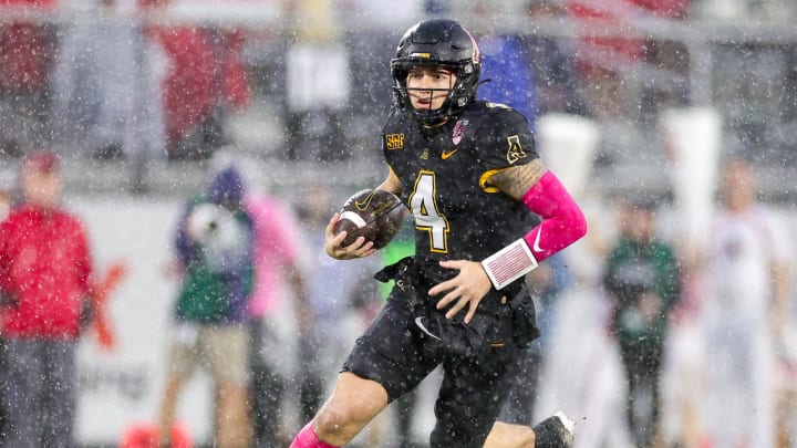 Dec 16, 2023; Orlando, FL, USA;  Appalachian State Mountaineers quarterback Joey Aguilar (4) runs with the ball against the Miami (OH) Redhawks in the second quarter during the Avocados from Mexico Cure Bowl at FBC Mortgage Stadium. Mandatory Credit: Nathan Ray Seebeck-USA TODAY Sports