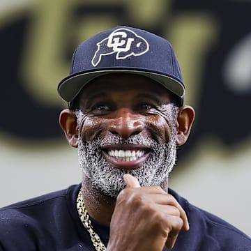 Apr 4, 2025; Boulder, CO, USA; Colorado Buffaloes head coach Deion Sanders watches as his players go through drills at the University of Colorado NFL Showcase at the CU Indoor Practice Facility. 