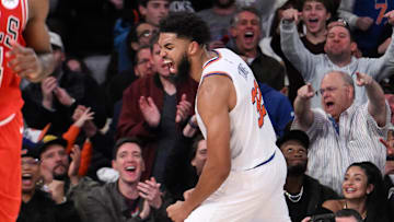 Nov 13, 2024; New York, New York, USA; New York Knicks center Karl-Anthony Towns (32) reacts after a dunk against the Chicago Bulls during the second half at Madison Square Garden.