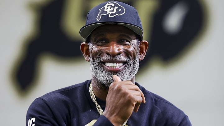 Apr 4, 2025; Boulder, CO, USA; Colorado Buffaloes head coach Deion Sanders watches as his players go through drills at the University of Colorado NFL Showcase at the CU Indoor Practice Facility. Mandatory Credit: Michael Ciaglo-Imagn Images