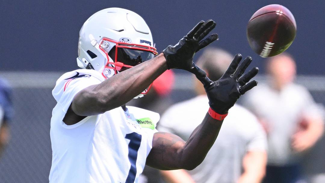 Jun 2, 2026; Foxborough, MA, USA; New England Patriots wide receiver A.J. Brown (1) makes a catch during the team's OTA at Gillette Stadium. Mandatory Credit: Eric Canha-Imagn Images