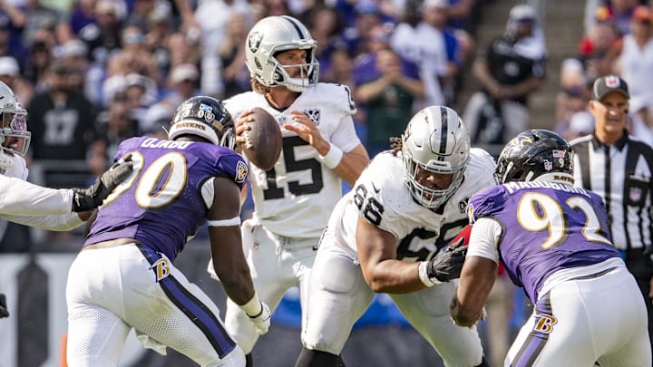 Sep 15, 2024; Baltimore, Maryland, USA;  Las Vegas Raiders quarterback Gardner Minshew (15) looks to pass from the pocket during the second half against the Baltimore Ravens at M&T Bank Stadium. Mandatory Credit: Tommy Gilligan-Imagn Images