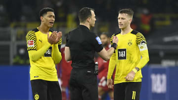 Felix Zwayer with Jude Bellingham and Marco Reus