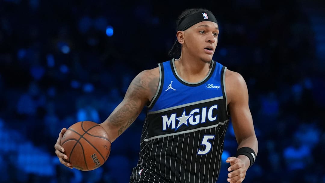 Dec 13, 2025; Las Vegas, Nevada, USA; Orlando Magic forward Paolo Banchero (5) brings the ball up court against the New York Knicks during the fourth quarter at T-Mobile Arena. Mandatory Credit: Kirby Lee-Imagn Images
