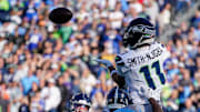Nov 23, 2025; Nashville, Tennessee, USA; Seattle Seahawks wide receiver Jaxon Smith-Njigba (11) catches a touchdown attempt but lands out of bounds during the second quarter against the Tennessee Titans at Nissan Stadium. Mandatory Credit: Denny Simmons-USA TODAY Network via Imagn Images