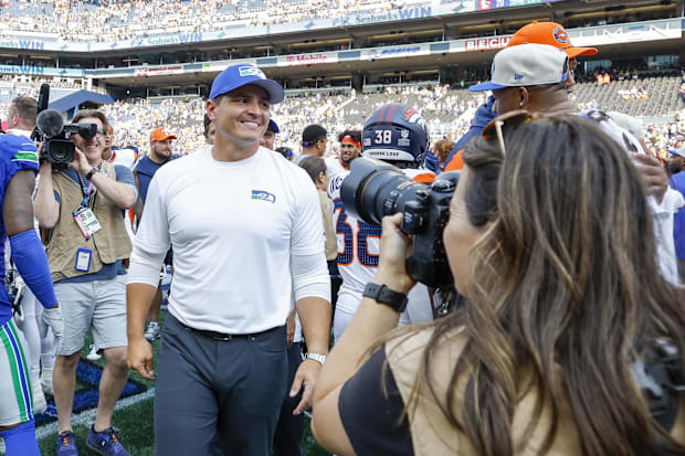 Seattle Seahawks head coach Mike Macdonald walks to the locker room following a victory against the Denver Broncos.