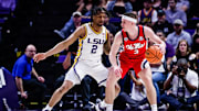 Feb 8, 2025; Baton Rouge, Louisiana, USA; Mississippi Rebels guard Sean Pedulla (3) dribbles against LSU Tigers guard Mike Williams III (2) during the first half at Pete Maravich Assembly Center. Mandatory Credit: Stephen Lew-Imagn Images