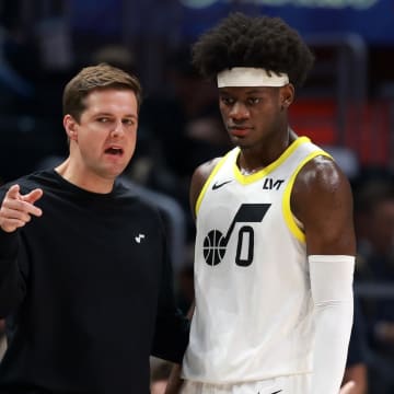 Apr 12, 2024; Los Angeles, California, USA;  Utah Jazz head coach Will Hardy (left) talks to forward Taylor Hendricks (0) during the third quarter against the Los Angeles Clippers at Crypto.com Arena. Mandatory Credit: Kiyoshi Mio-USA TODAY Sports
