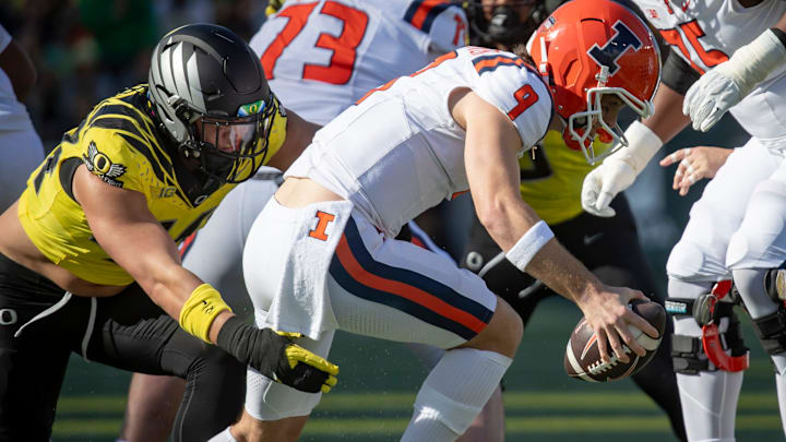Oregon outside linebacker Teitum Tuioti sacks Illinois quarterback Luke Altmyer as the No. 1 Oregon Ducks host the No. 21 Illinois Fighting Illini Saturday, Oct. 26, 2024 at Autzen Stadium in Eugene, Ore.