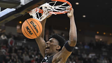 Mar 20, 2025; Providence, RI, USA;  Omaha Mavericks forward Marquel Sutton (10) scores against St. John's Red Storm during the first half at Amica Mutual Pavilion. Mandatory Credit: Eric Canha-Imagn Images