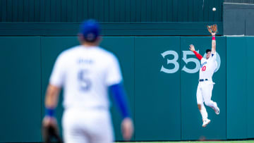 Oklahoma City Dodgers outfielder Ryan Ward (10) jumps up to catch a ball headed over the fence during a Minor League Baseball game between the Oklahoma City Dodgers and the Las Vegas Aviators at Chickasaw Bricktown Ballpark in Oklahoma City on Wednesday, June 21, 2023.