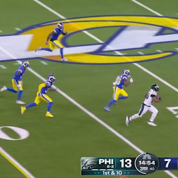 Philadelphia Eagles RB Saquon Barkley runs for a touchdown against the Los Angeles Rams on Nov. 24, 2024.
