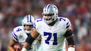 Sep 25, 2017; Glendale, AZ, USA; Dallas Cowboys offensive tackle La'el Collins (71) blocks for QB Dak Prescott.