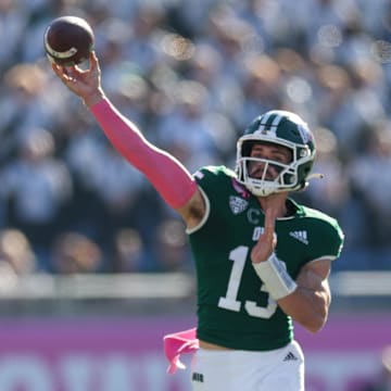 Dec 20, 2024; Orlando, FL, USA; Ohio Bobcats quarterback Parker Navarro (13) throws a pass against the Jacksonville State Gamecocks in the third quarter at Camping World Stadium. Mandatory Credit: Nathan Ray Seebeck-Imagn Images