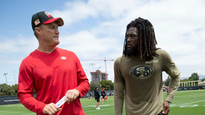 San Francisco 49ers general manager John Lynch (L) and wide receiver Brandon Aiyuk (R)