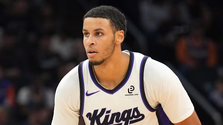 Jan 2, 2026; Phoenix, Arizona, USA; Sacramento Kings forward Keegan Murray (13) controls the ball against the Phoenix Suns during the second half at Mortgage Matchup Center. Mandatory Credit: Joe Camporeale-Imagn Images