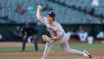 Toronto Blue Jays No. 3 prospect Jake Bloss, pitching in the Oakland Coliseum.
