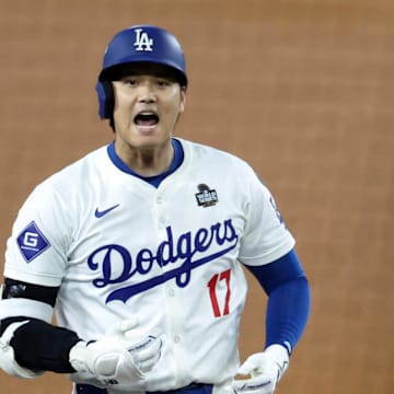 Los Angeles Dodgers designated hitter Shohei Ohtani on third base. 