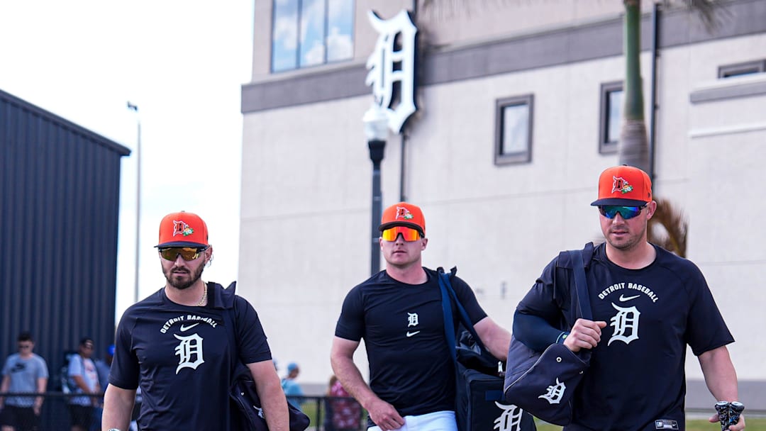  Detroit Tigers infielder Zach McKinstry, Kevin McGonigle and Spencer Torkelson walk toward the practice field.
