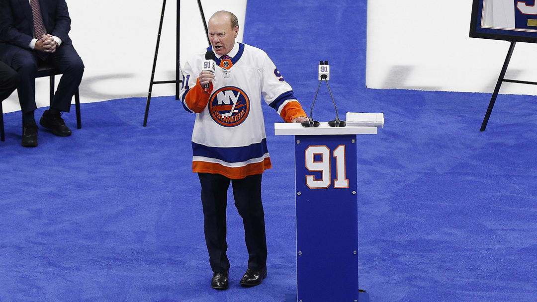 Feb 29, 2020; Uniondale, New York, USA;  Former New York Islanders player Butch Goring addresses the fans during the ceremony retiring his number 91 jersey prior to the game against the Boston Bruins at Nassau Veterans Memorial Coliseum. Mandatory Credit: Andy Marlin-Imagn Images