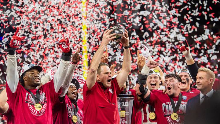 Indiana Head Coach Curt Cignetti and the Hoosies celebrate after the Indiana versus Ohio State Big Ten Championship football game at Lucas Oil Stadium on Saturday, Dec. 6, 2025.