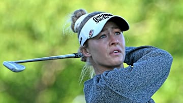Aug 21, 2025; Mississauga, Ontario, CAN;  Nelly Korda plays her tee shot at the third hole during first round play at the CPKC Women's Open golf tournament. Mandatory Credit: Dan Hamilton-Imagn Images