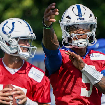 Indianapolis Colts players Daniel Jones (17) and Anthony Richardson Sr. (5) throw passes during the Colts training camp at Grand Park on Saturday, July 26, 2025, in Westfield, Ind.