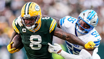 Detroit Lions linebacker Derrick Barnes (55) tackles Green Bay Packers running back Josh Jacobs (8) during the second half at Lambeau Field in Green Bay, Wis., on Sunday, September 7, 2025.