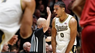 Purdue Boilermakers guard C.J. Cox reacts after scoring against the Alabama Crimson Tide.