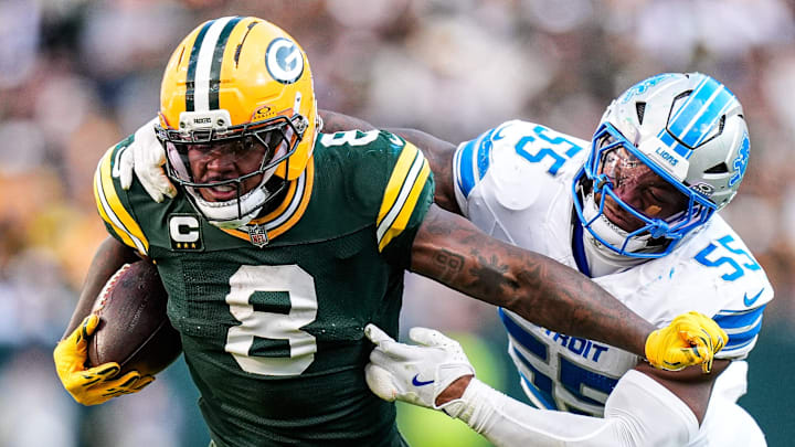 Detroit Lions linebacker Derrick Barnes (55) tackles Green Bay Packers running back Josh Jacobs (8) during the second half at Lambeau Field in Green Bay, Wis., on Sunday, September 7, 2025.