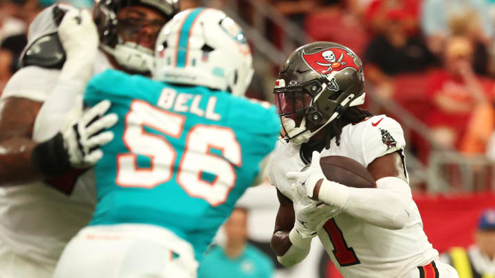 Aug 23, 2024; Tampa, Florida, USA; Tampa Bay Buccaneers running back Rachaad White (1) runs the ball in for a Tampa Bay Buccaneers against the Miami Dolphins  during the first quarter at Raymond James Stadium. Mandatory Credit: Kim Klement Neitzel-USA TODAY Sports