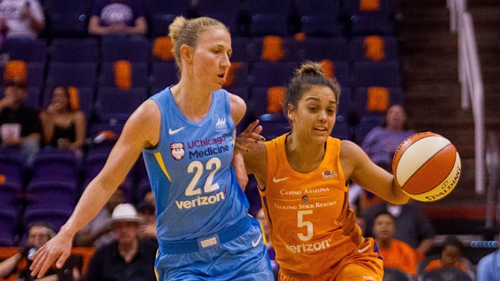 Jun 8, 2018; Phoenix, AZ, USA; Phoenix Mercury guard Leilani Mitchell drives the ball past Chicago Sky guard Courtney Vandersloot during the first half at Talking Stick Resort Arena. Mandatory Credit: Brian Munoz-The Arizona Republic via USA TODAY NETWORK