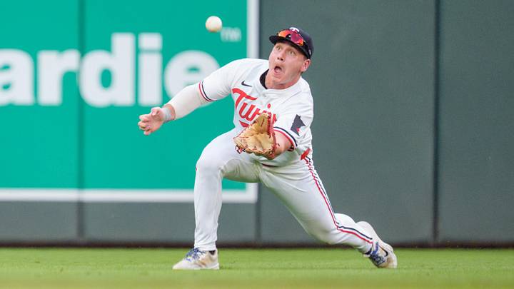 Aug 9, 2025; Minneapolis, Minnesota, USA; Minnesota Twins left fielder Alan Roden (19) catches a ball hit by Kansas City Royals first base Vinnie Pasquantino (not pictured) in the sixth inning at Target Field. Mandatory Credit: Matt Blewett-Imagn Images
