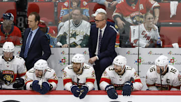 May 28, 2025; Raleigh, North Carolina, USA; Florida Panthers head coach Paul Maurice (lright) looks on during the second period against the Carolina Hurricanes in game five of the Eastern Conference Final of the 2025 Stanley Cup Playoffs at Lenovo Center. Mandatory Credit: Geoff Burke-Imagn Images