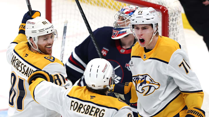 Mar 17, 2026; Winnipeg, Manitoba, CAN; Nashville Predators right wing Matthew Wood (71) celebrates a goal on Winnipeg Jets goaltender Connor Hellebuyck (37) in the third period at Canada Life Centre. Mandatory Credit: James Carey Lauder-Imagn Images