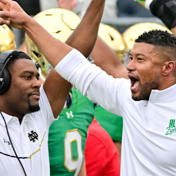 Sep 28, 2024; South Bend, Indiana, USA; Notre Dame Fighting Irish head coach Marcus Freeman reacts after a turnover on downs by the Louisville Cardinals in the second quarter at Notre Dame Stadium.
