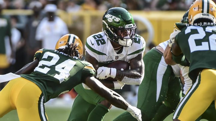 New Packers running back La'Mical Perine (22) is shown running against the Packers in the 2021 preseason.