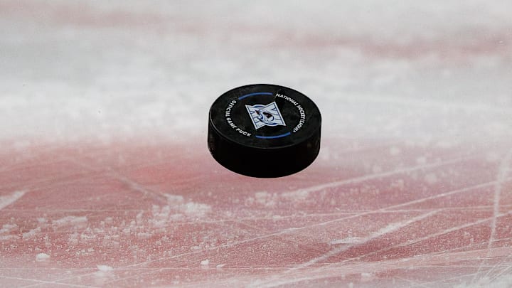 Feb 26, 2026; Denver, Colorado, USA; A detail view of the puck in the first period between the Colorado Avalanche and the Minnesota Wild at Ball Arena. Mandatory Credit: Isaiah J. Downing-Imagn Images