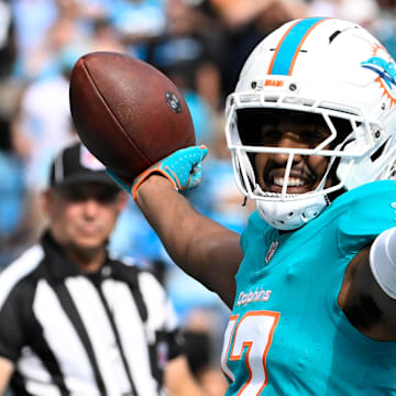 Oct 5, 2025; Charlotte, North Carolina, USA; Miami Dolphins wide receiver Jaylen Waddle (17) celebrates after scoring a touchdown in the fourth quarter at Bank of America Stadium. 