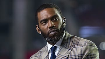 Dec 13, 2021; Glendale, Arizona, USA; ESPN analyst Randy Moss prior to the Arizona Cardinals game against the Los Angeles Rams at State Farm Stadium. Mandatory Credit: Mark J. Rebilas-Imagn Images