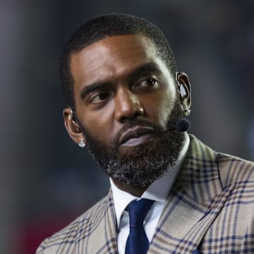 Dec 13, 2021; Glendale, Arizona, USA; ESPN analyst Randy Moss prior to the Arizona Cardinals game against the Los Angeles Rams at State Farm Stadium. Mandatory Credit: Mark J. Rebilas-Imagn Images