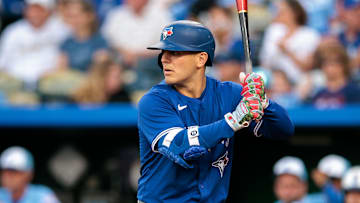 Sep 20, 2025; Kansas City, Missouri, USA;  Toronto Blue Jays outfielder Daulton Varsho (5) at bat during the first inning against the Kansas City Royals at Kauffman Stadium. Mandatory Credit: William Purnell-Imagn Images