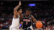 Nov 14, 2025; Inglewood, California, USA;  Arizona Wildcats guard Dwayne Aristode (2) dribbles the ball against UCLA Bruins guard Skyy Clark (55) during the first half of the Hall of Fame Series game at Intuit Dome. Mandatory Credit: Kiyoshi Mio-Imagn Images
