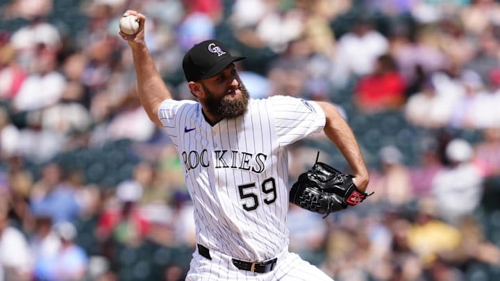May 22, 2025; Denver, Colorado, USA; Colorado Rockies relief pitcher Jake Bird (59) delivers the ball in the eighth inning against the Philadelphia Phillies at Coors Field.