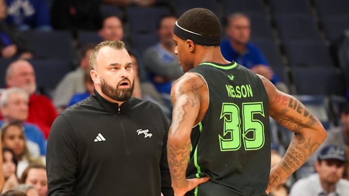 Mar 5, 2026; Memphis, Tennessee, USA; South Florida Bulls head coach Bryan Hodgson talks to forward Izaiyah Nelson (35) during the first half against the Memphis Tigers at FedExForum.