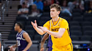 Mar 12, 2025; Indianapolis, IN, USA;  Minnesota Golden Gophers guard Brennan Rigsby (24) celebrates a made basket in the first half against the Northwestern Wildcats at Gainbridge Fieldhouse. Mandatory Credit: Trevor Ruszkowski-Imagn Images